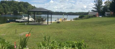 View of waterfront, gazebo and beach.