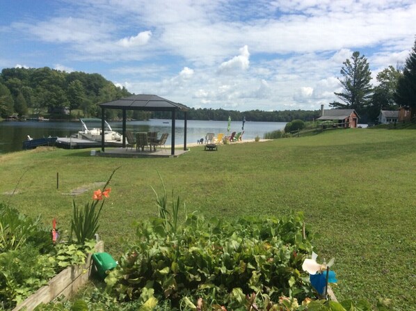 View of waterfront, gazebo and beach.