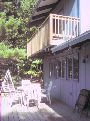 Deck off Living Room, balcony off upstairs Bedroom.