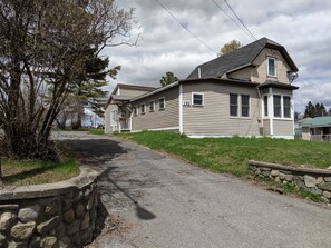 Front of the house. Park anywhere in the driveway.