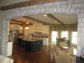 View of kitchen and sitting room from living room