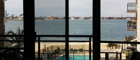 View of Sail Bay from the Great Room. The front wall is all windows and view.