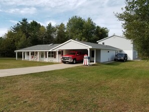 From the Road view of property.  Apartment in the back. There is lots of parking