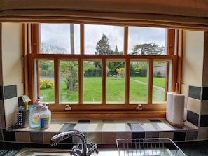 Fully fitted kitchen with oven, hob, dishwasher, fridge and freezer