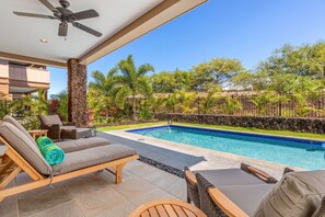 Alternate view of pool deck with plush seating.