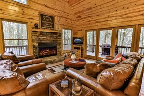Living room with wood burning fireplace