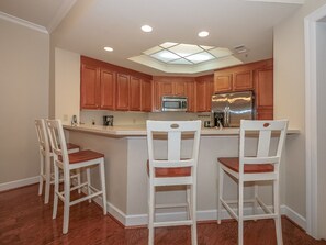 Kitchen with Breakfast Counter at 8123 Wendover Dunes