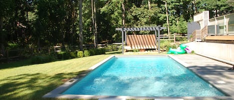 Pool Lounge area. Separate from the deck connected to the house and fenced in. 