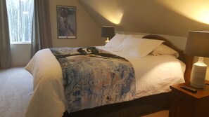 Bedroom #2 (upstairs loft) with queen bed, twin bed, dresser and nightstands