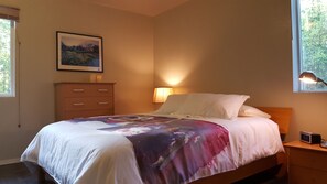 Bedroom #1 (first floor) with queen bed, dressers and nightstands