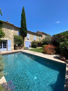 Charming house with garden and pool in the heart of a village 15 kms from Nîmes