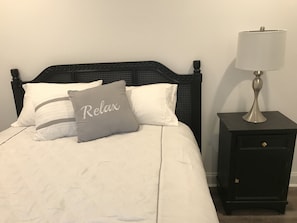 Bedroom with queen bed. 