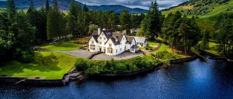 Lochside House, with lounge and bedrooms overlooking the loch