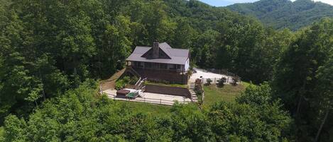 Drone shot looking at the back of cabin