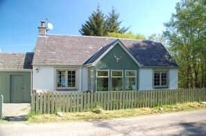 Front of the cottage. The other side looks out to the garden and Loch Knockie.