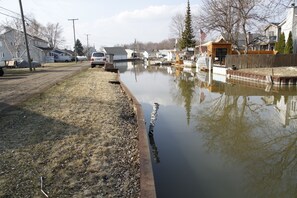 view from canal side by road, perfect for kids to kayak while you relax!