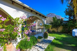 Colourful display of flowers on balcony