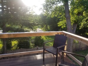 elevated west facing deck with 4 nice chairs...amazing evening sights and sounds