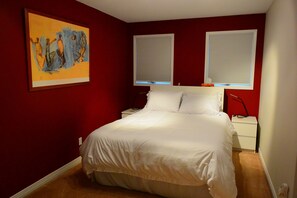  Second bedroom features queen bed and desk/work area.