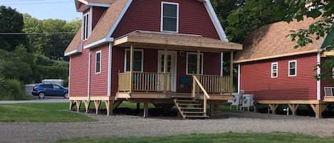 Two cottages that are mirror images of each other