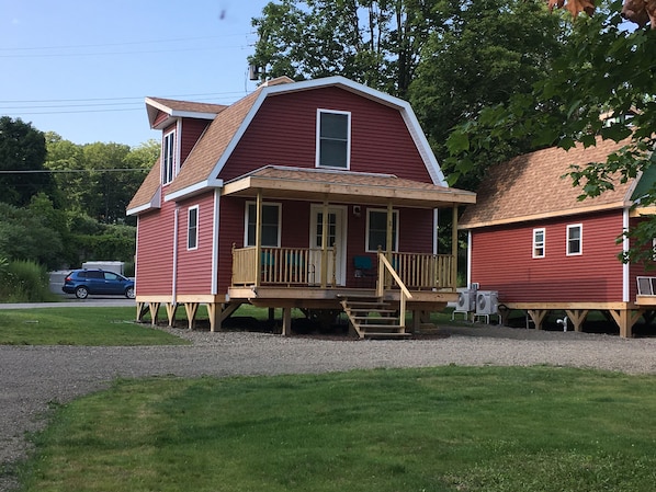 Two cottages that are mirror images of each other