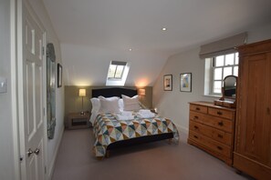 First floor: Bedroom one with a 5' king-size bed