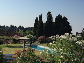 A view of the pool area at sunset