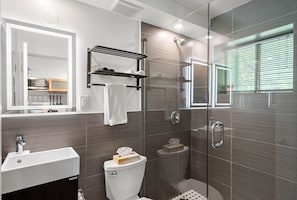 Bathroom with Glass Walk-in Shower - Furnished Apartments in Atlanta - Chic Premium Studios On 25th