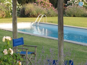 Another view of the pool, the area is surrounded by perfumed and colorful plants