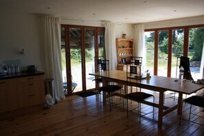 Dining area comfortably seating six.