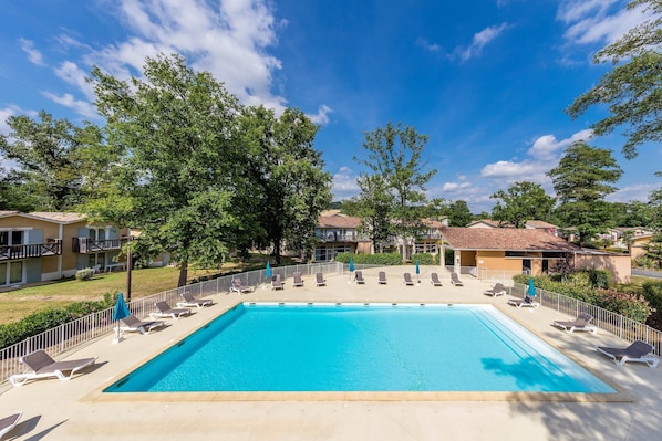 Take in gorgeous views while lounging around the on-site outdoor pools.