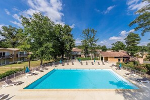Take in gorgeous views while lounging around the on-site outdoor pools.