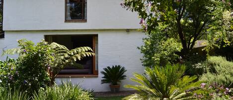 view of the house from the garden - with huge sliding window.