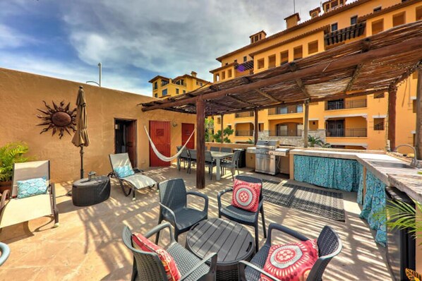 Rooftop Deck.  Full Grill, plenty of seating, Hammock + Fridge