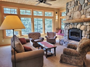 This cozy living room overlooks a wildlife preserve.