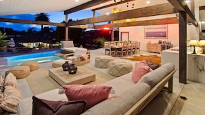  casita living room area, view of kitchen counters and dining table, view of Jacuzzi and entrance to the bedroom