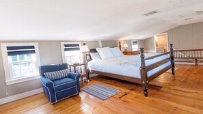 Master bedroom with steps  to kitchen below, third floor BD/BA widows walk above