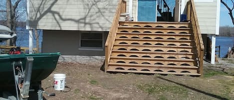 front of cottage while under construction
