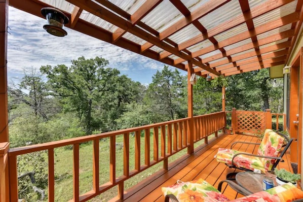 Wonderful, private, relaxing back porch with view of the woods