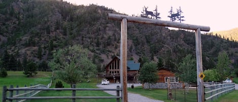 Cute cabin sits in the forefront of the owner's home - shared driveway