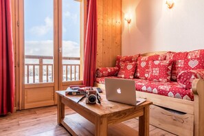 Sink into the cozy sofa after a day exploring the area.