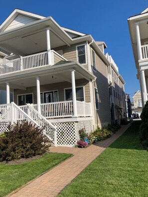 Walkway to garage located behind the house 