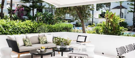 Large terrasse on ground floor, the pool just over .