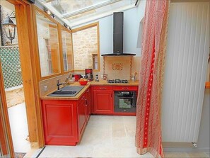 the superbly fitted kitchen and conservatory 