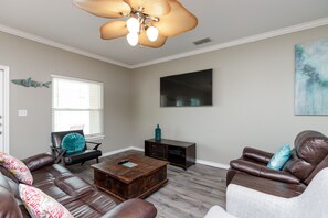 Entertainment center with flat-screen TV and streaming services
