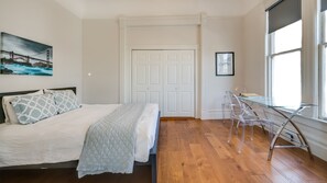 Desk in master bedroom with natural light.