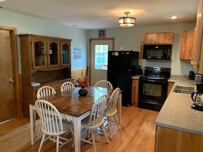 Kitchen with table for 6; well stocked 