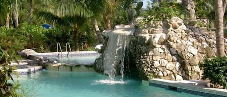 Relax in our waterfall pool - Just steps from Viola's Bar and Cafe