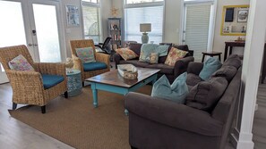 Living room with comfortable seating for your group.