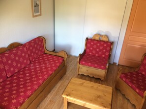 Sink into the cozy sofa after a day exploring the area.